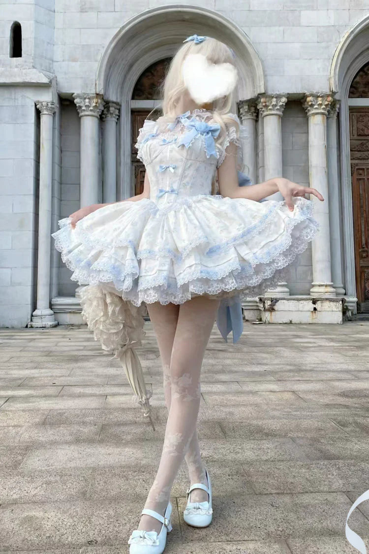 Design Concept: 
Immerse yourself in a fairy tale with this complete Sweet Lolita coord set. The set features a beautiful blue colorway with an all-over delicate floral print, perfect for creating a sweet and romantic look. The centerpiece is a Jumperskirt (JSK) dress, adorned with multi-layered ruffles, intricate lace, and a charming bow detail. The matching blouse complements the dress perfectly, creating a harmonious and fully styled silhouette.