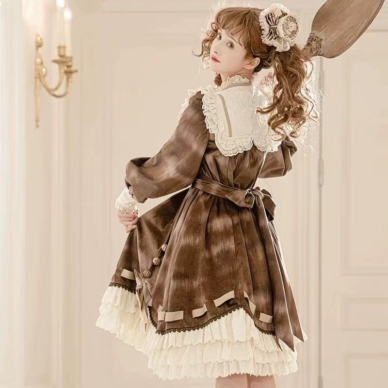 Design Concept:
This Sweet Lolita brown dress features charming bow and lace details with a waist-cinched design, blending elegance with a cute and sweet style that embodies classic Lolita charm. The warm brown tone adds a cozy and refined touch, making it a versatile choice for both daily wear and special occasions. Product Details: The product includes one dress with a matching belt, designed to enhance the silhouette while providing a polished and harmonious look that captures the essence of sweet Lolit