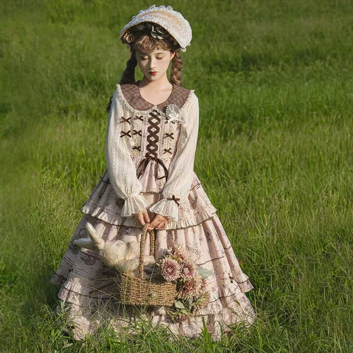 Design Concept:
This Sweet Lolita brown elegant daily dress set combines a refined silhouette with delicate lace and bow details, presenting a graceful and charming style suitable for everyday Lolita fashion. Product Details: The set includes one coat and one dress, offering a coordinated outfit that balances sweetness and elegance.