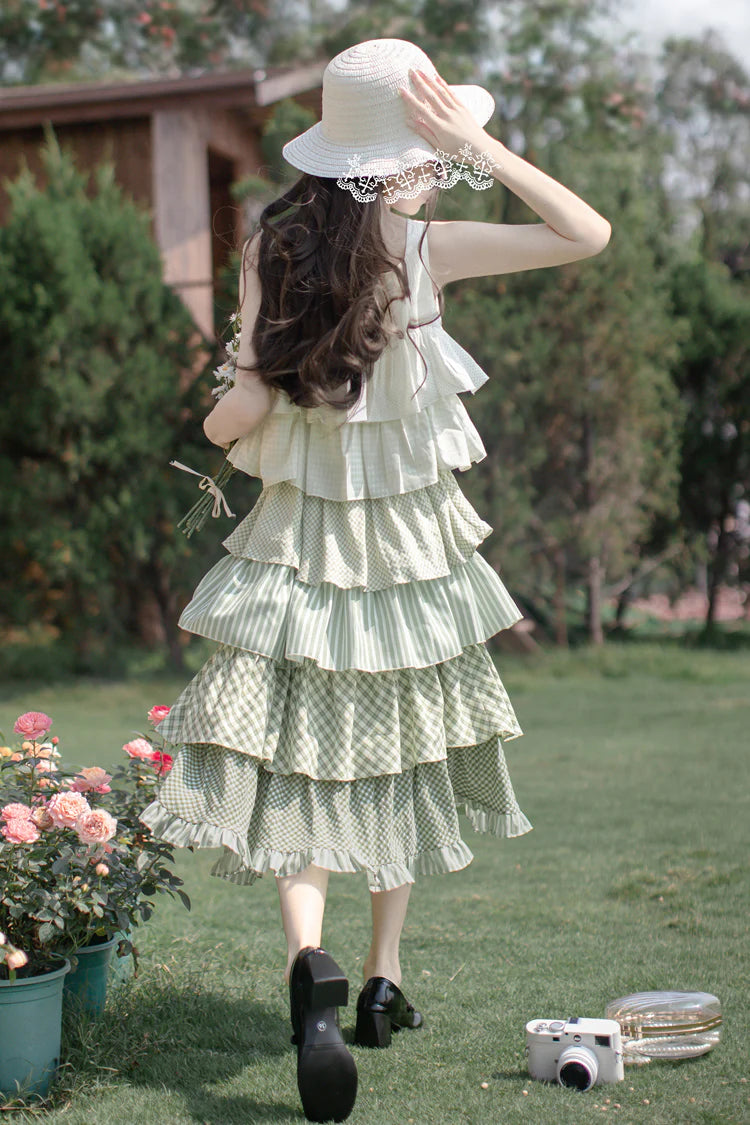 Design Concept:
This Sweet Lolita green layered printed ruffle JSK dress captures a playful holiday charm with its soft tones and delicate details. The multi-layered ruffles add volume and elegance, while the printed design enhances its sweet and lively style. The product includes one dress with a matching belt, creating a coordinated and flattering Lolita look.