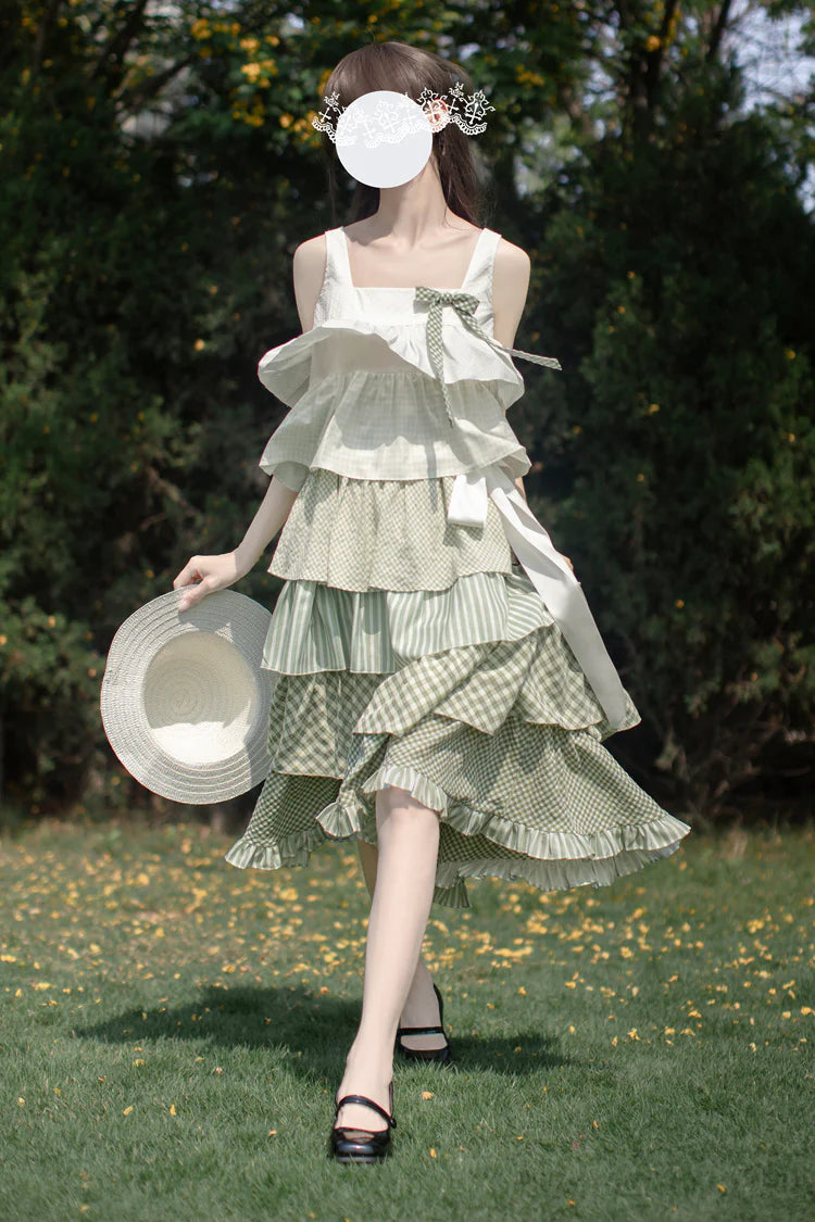 Design Concept:
This Sweet Lolita green layered printed ruffle JSK dress captures a playful holiday charm with its soft tones and delicate details. The multi-layered ruffles add volume and elegance, while the printed design enhances its sweet and lively style. The product includes one dress with a matching belt, creating a coordinated and flattering Lolita look.