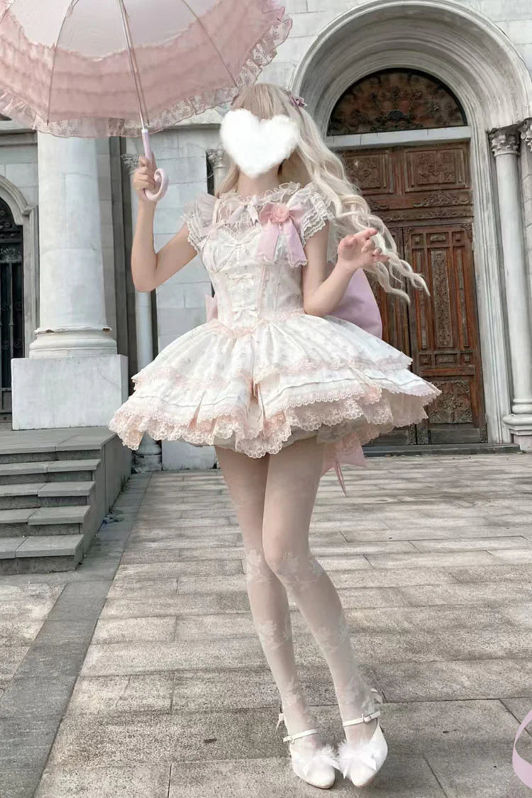 Design Concept: 
This Sweet Lolita pink layered printed JSK dress set combines playful charm with delicate elegance, featuring soft ruffles, intricate lace, and bow details for a delightful Lolita style. The pastel pink tone enhances its sweet and romantic appeal. The product includes a dress, a matching blouse, and a trailing tail, creating a complete and enchanting ensemble.