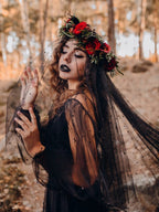 This design redefines traditional bridal elegance with a dark, romantic twist. Featuring lustrous black pearls delicately adorning a sheer veil, it captures a hauntingly beautiful aesthetic. Perfect for vintage photoshoots, it adds a touch of gothic rebellion to bridal portraits. As a Halloween accessory, it embodies the mystical "witch bride" persona, blending drama, mystery, and timeless sophistication.