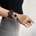The Black Retro Fashion Gemstone Butterfly Gothic Lolita Ring Bracelet is designed to embody elegance with a dark romantic twist. Inspired by vintage aesthetics, it features a delicate butterfly motif paired with shimmering gemstones that create a mysterious, enchanting aura. The connected ring and bracelet design adds uniqueness and drama, making it an ideal accessory for Gothic Lolita outfits. Both stylish and expressive, it highlights individuality while enhancing the charm of any retro or Lolita-inspire