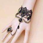 The Black Retro Fashion Gemstone Butterfly Gothic Lolita Ring Bracelet is designed to embody elegance with a dark romantic twist. Inspired by vintage aesthetics, it features a delicate butterfly motif paired with shimmering gemstones that create a mysterious, enchanting aura. The connected ring and bracelet design adds uniqueness and drama, making it an ideal accessory for Gothic Lolita outfits. Both stylish and expressive, it highlights individuality while enhancing the charm of any retro or Lolita-inspire