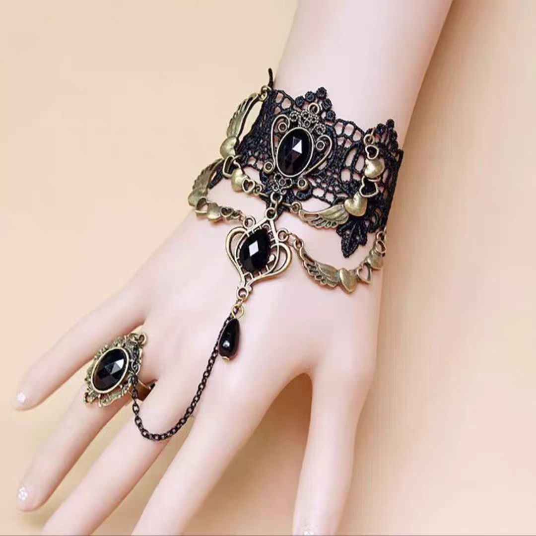 The Black Retro Fashion Gemstone Butterfly Gothic Lolita Ring Bracelet is designed to embody elegance with a dark romantic twist. Inspired by vintage aesthetics, it features a delicate butterfly motif paired with shimmering gemstones that create a mysterious, enchanting aura. The connected ring and bracelet design adds uniqueness and drama, making it an ideal accessory for Gothic Lolita outfits. Both stylish and expressive, it highlights individuality while enhancing the charm of any retro or Lolita-inspire