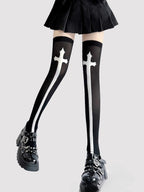 Inspired by the rebellious fusion of gothic punk and JK fashion, these thigh-high socks blend dark elegance with subcultural edge. The stark black-and-white contrast and symbolic cross motifs evoke a provocative yet sophisticated vibe. Perfect for Halloween events, cosplay, or streetwear statements, they embody a fearless expression of alternative style with a touch of daring allure.