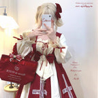The Classic Black Red Rose Lolita OP Dress captures the timeless allure of vintage palace fashion. Featuring delicate lace, cross details, and rose accents, it balances elegance with gothic romance. The striking black and red color palette enhances its dramatic charm, while the refined silhouette highlights sophistication. Perfect for tea parties, gothic gatherings, or special events, this OP dress embodies the essence of classic Lolita grace with a touch of mysterious nobility.