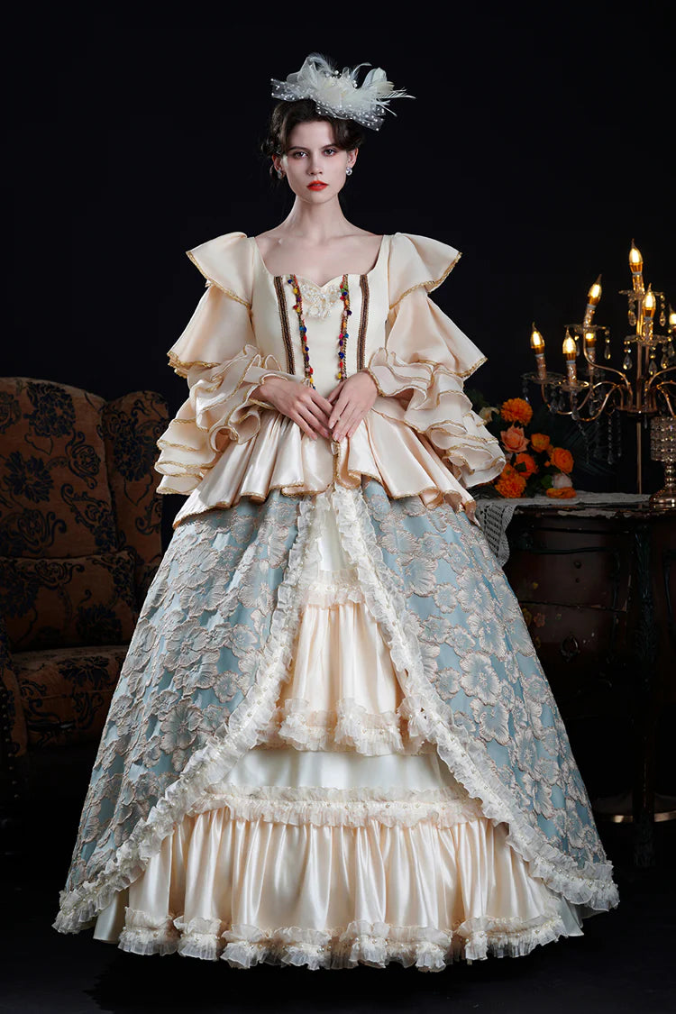 Adorn yourself in timeless elegance with this exquisite Victorian-style Lolita dress. Delicately crafted in soft blue or champagne hues, the gown features dramatic bell sleeves adorned with tiered lace frills and intricate embroidered details. The fitted bodice flows into a classic princess silhouette, embodying royal romance and sophistication. Perfect for formal events, tea parties, or photography, this piece captures the opulence of Victorian fashion with a delicate Lolita charm.