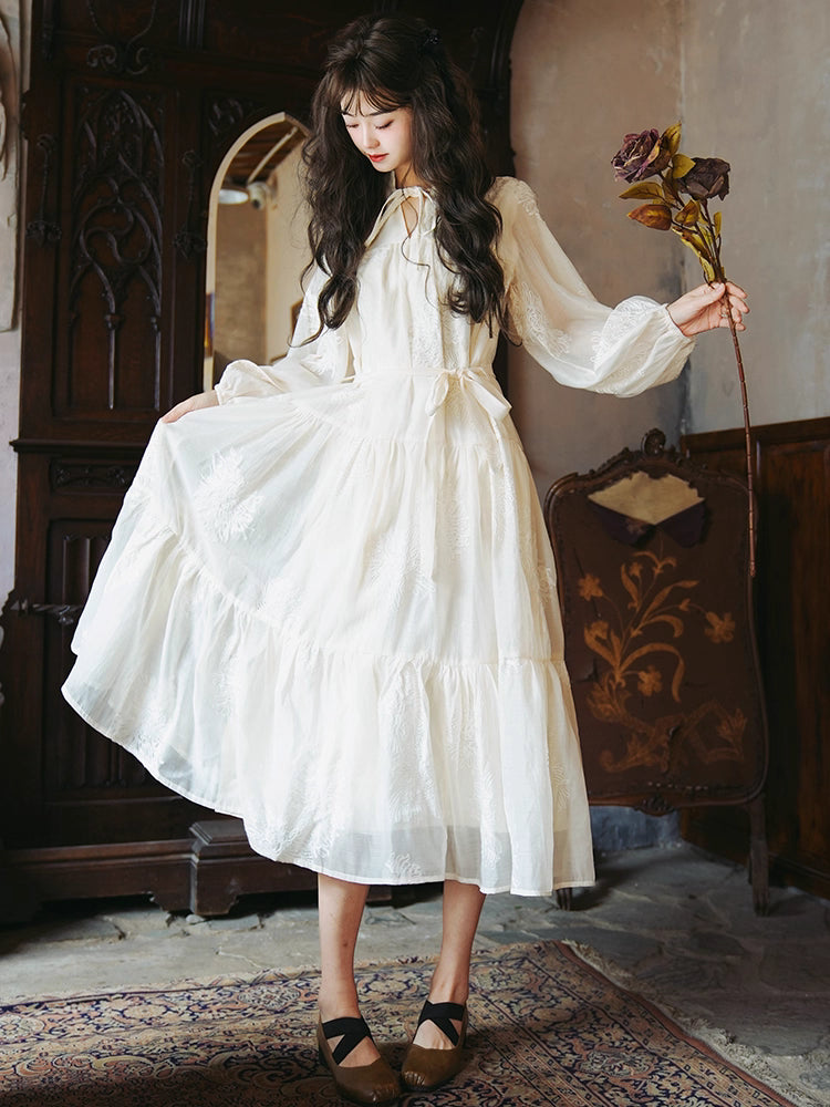 Inspired by the timeless elegance of French vintage fashion, this maxi dress features delicate floral embroidery on breathable Tencel fabric. The relaxed A-line silhouette and flowing skirt create a dreamy, feminine movement, while the adjustable waist tie allows for a customizable fit. Designed for the free-spirited woman who appreciates bohemian romance and effortless grace, this piece blends artisan craftsmanship with soft, sustainable luxury for a truly enchanting wardrobe staple.