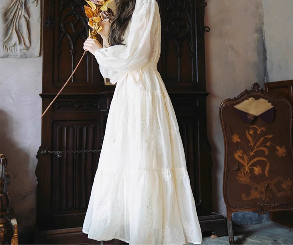 Inspired by the timeless elegance of French vintage fashion, this maxi dress features delicate floral embroidery on breathable Tencel fabric. The relaxed A-line silhouette and flowing skirt create a dreamy, feminine movement, while the adjustable waist tie allows for a customizable fit. Designed for the free-spirited woman who appreciates bohemian romance and effortless grace, this piece blends artisan craftsmanship with soft, sustainable luxury for a truly enchanting wardrobe staple.