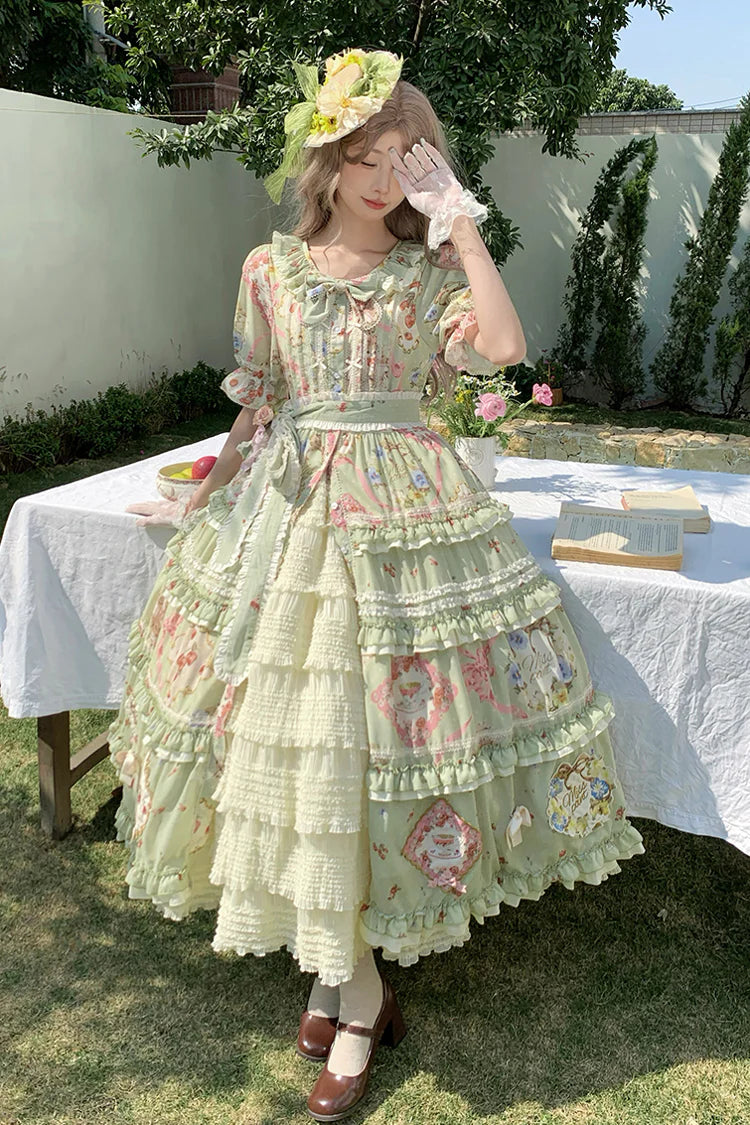 The Green Print Lolita Dress is designed to showcase classic sweetness with a touch of elegance. Featuring short sleeves and a light cardigan-style overlay, it combines comfort with refined detail. Delicate ruffles, bowknot accents, and soft printed patterns create a graceful, layered silhouette. The fresh green tone enhances its lively yet sophisticated charm, making it perfect for daily wear, tea parties, or special gatherings in true Lolita style.