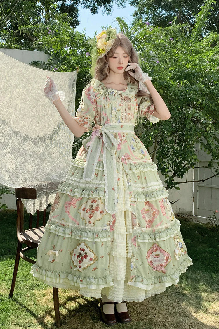 The Green Print Lolita Dress is designed to showcase classic sweetness with a touch of elegance. Featuring short sleeves and a light cardigan-style overlay, it combines comfort with refined detail. Delicate ruffles, bowknot accents, and soft printed patterns create a graceful, layered silhouette. The fresh green tone enhances its lively yet sophisticated charm, making it perfect for daily wear, tea parties, or special gatherings in true Lolita style.