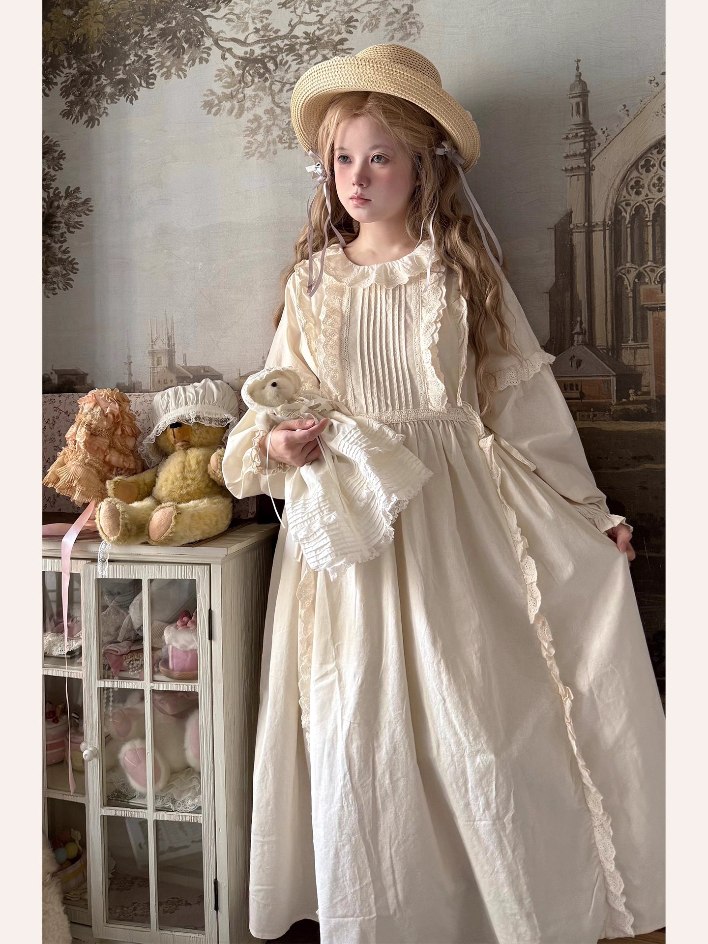 Inspired by romantic French countryside aesthetics, this dress combines delicate embroidery with soft tiered ruffles and voluminous bubble sleeves. The loose high-waist silhouette flows gracefully in lightweight fabric, while intricate floral motifs and a warm beige palette evoke nostalgic elegance. Perfect for autumn gatherings, it blends vintage charm with effortless comfort—a poetic homage to pastoral beauty and timeless femininity.