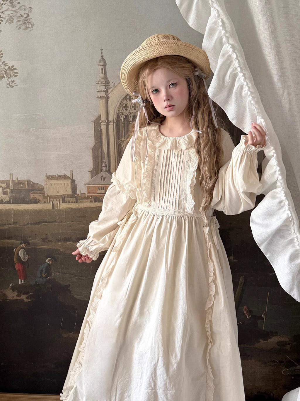Inspired by romantic French countryside aesthetics, this dress combines delicate embroidery with soft tiered ruffles and voluminous bubble sleeves. The loose high-waist silhouette flows gracefully in lightweight fabric, while intricate floral motifs and a warm beige palette evoke nostalgic elegance. Perfect for autumn gatherings, it blends vintage charm with effortless comfort—a poetic homage to pastoral beauty and timeless femininity.