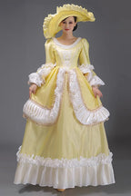 Evoking the delicate grace of a summer garden party, this dress blends timeless elegance with playful charm. The halter neckline and sleeveless design highlight feminine shoulders, while layers of lace ruffles and satin bows cascade like blooming petals. Crafted in a soft ivory-pink hue, it captures the essence of romance—inviting the wearer to step into a dream where sweetness and sophistication dance in perfect harmony.
