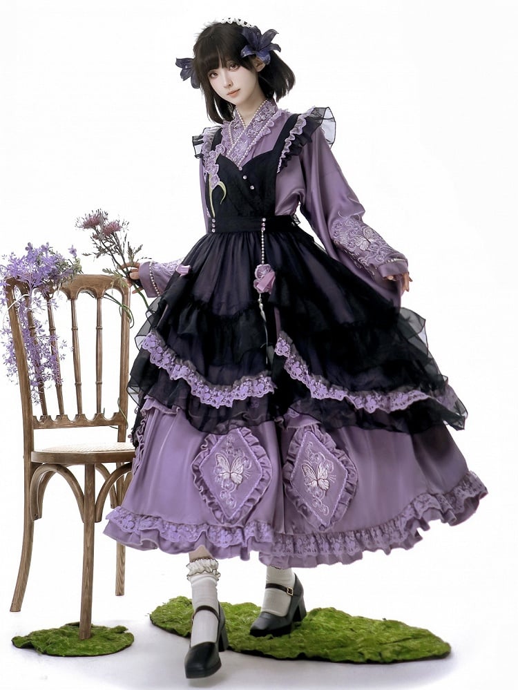 The Classic Purple Han Lolita Dress Set is designed to blend traditional elegance with Lolita sweetness. Featuring delicate butterfly and floral embroidery, it showcases refined craftsmanship and a graceful silhouette. The rich purple tone conveys nobility and charm, while the contrasting black apron adds depth and vintage flair. Perfect for cultural events, tea parties, or special gatherings, this full set reflects the harmonious fusion of Han-inspired beauty and Lolita fashion.
