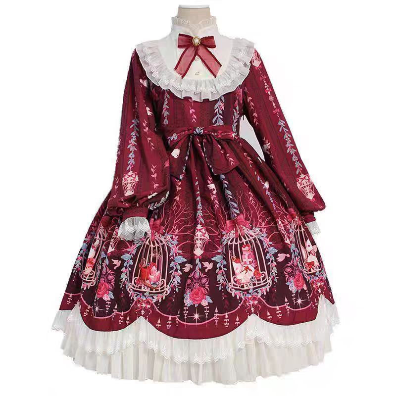 The Red Classic Lolita OP Dress is designed to express timeless elegance with a sweet touch. Featuring long sleeves for autumn and winter wear, it is adorned with delicate lace and charming bow tie details that highlight femininity. The fitted bodice with lace-up accents creates a graceful silhouette, while the rich red tone conveys warmth and sophistication. Perfect for tea parties, gatherings, or seasonal occasions, this dress captures the romantic spirit of classic Lolita fashion.