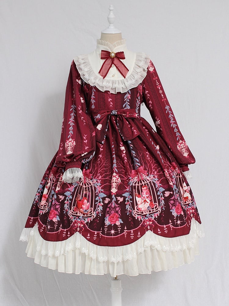 The Red Classic Lolita OP Dress is designed to express timeless elegance with a sweet touch. Featuring long sleeves for autumn and winter wear, it is adorned with delicate lace and charming bow tie details that highlight femininity. The fitted bodice with lace-up accents creates a graceful silhouette, while the rich red tone conveys warmth and sophistication. Perfect for tea parties, gatherings, or seasonal occasions, this dress captures the romantic spirit of classic Lolita fashion.