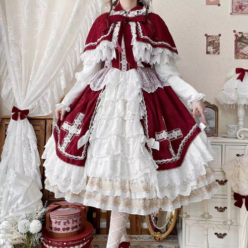 This Red Classic Vintage Doll Lolita JSK Dress is inspired by the elegance of bridal fashion and the sweetness of doll-like charm. The deep red tone conveys romance and nobility, while the structured JSK silhouette highlights a graceful figure. Delicate lace and vintage details add refinement, making it perfect for tea parties, weddings, or special occasions. Designed to blend timeless elegance with Lolita’s dreamy aesthetic, this dress captures both beauty and sophistication.
