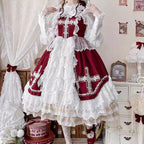 This Red Classic Vintage Doll Lolita JSK Dress is inspired by the elegance of bridal fashion and the sweetness of doll-like charm. The deep red tone conveys romance and nobility, while the structured JSK silhouette highlights a graceful figure. Delicate lace and vintage details add refinement, making it perfect for tea parties, weddings, or special occasions. Designed to blend timeless elegance with Lolita’s dreamy aesthetic, this dress captures both beauty and sophistication.