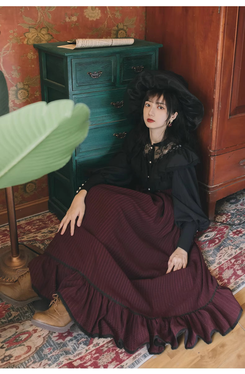 Design Concept:
This Classic Lolita two-piece set features a black lace long-sleeve blouse paired with a deep red striped skirt, drawing inspiration from European vintage court fashion. The harmonious blend of delicate lace and rich wine-red tones creates a look that is both refined and timeless, exuding elegance and a touch of aristocratic charm. Perfect for crafting a dignified Lolita style that balances romantic sophistication with graceful femininity.