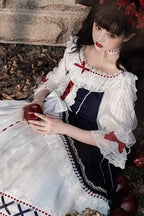 The Classic Snow Princess Lolita Dress is designed to evoke purity and fairytale elegance. Crafted in soft white and blue, it features half sleeves, cascading ruffles, and a tiered silhouette that enhances volume and charm. The design captures the grace of a winter princess while keeping the sweetness of Lolita style. Perfect for special occasions, tea parties, or seasonal gatherings, it blends romance, refinement, and timeless beauty.