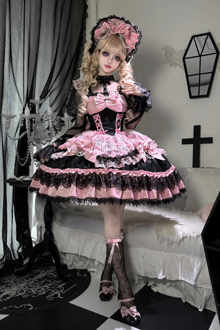 The Black Pink Ballet Lolita JSK Dress is crafted to express elegance with a playful, dance-inspired charm. Featuring a sleeveless cut, layered ruffles, and delicate lace, it creates a graceful silhouette reminiscent of a ballerina’s costume. The lace-up detail ensures both beauty and flexibility, while bow accents add sweetness to the design. With its striking black and pink contrast, this dress is perfect for tea parties, performances, or special Lolita occasions.