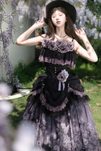 The Black Purple Gothic Lolita Skirt Set is designed to combine sweet details with a dark, elegant charm. Featuring a sleeveless cut, layered ruffles, and delicate lace, it creates a graceful yet dramatic silhouette. The striking black and purple tones enhance its mysterious aura, while bow accents add a touch of sweetness. Perfect for Halloween, themed events, or daily gothic styling, this set embodies the unique balance of Gothic and Sweet Lolita fashion.