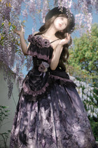 The Black Purple Gothic Lolita Skirt Set is designed to combine sweet details with a dark, elegant charm. Featuring a sleeveless cut, layered ruffles, and delicate lace, it creates a graceful yet dramatic silhouette. The striking black and purple tones enhance its mysterious aura, while bow accents add a touch of sweetness. Perfect for Halloween, themed events, or daily gothic styling, this set embodies the unique balance of Gothic and Sweet Lolita fashion.