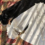 Embrace timeless elegance with our Elegant Melody set, blending Gothic charm with light Lolita grace. This coordinated ensemble features a delicate blouse and an A-line skirt designed to create a flattering silhouette. Intricate lace details and vintage-inspired accents evoke a sense of poetic romance, while the dark color palette adds depth and sophistication. Perfect for tea parties or evening gatherings, this set offers a harmonious balance between classic refinement and wearable comfort. Pre-order now t