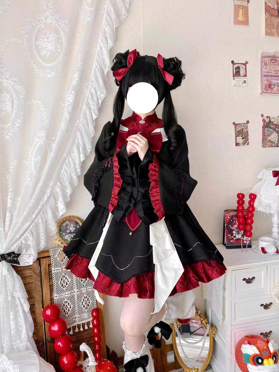 The Classic Black Red Lapel Collar Lolita Maid OP Dress captures a refined balance of elegance and playful sweetness. Its structured lapel collar, paired with charming bowknot details, highlights a delicate maid-inspired aesthetic. Long sleeves and layered ruffles enhance both comfort and volume, while the timeless black palette makes it versatile for multiple occasions. Perfect for tea parties, daily outings, or themed gatherings, this OP dress embodies classic Lolita grace with a touch of maid allure.