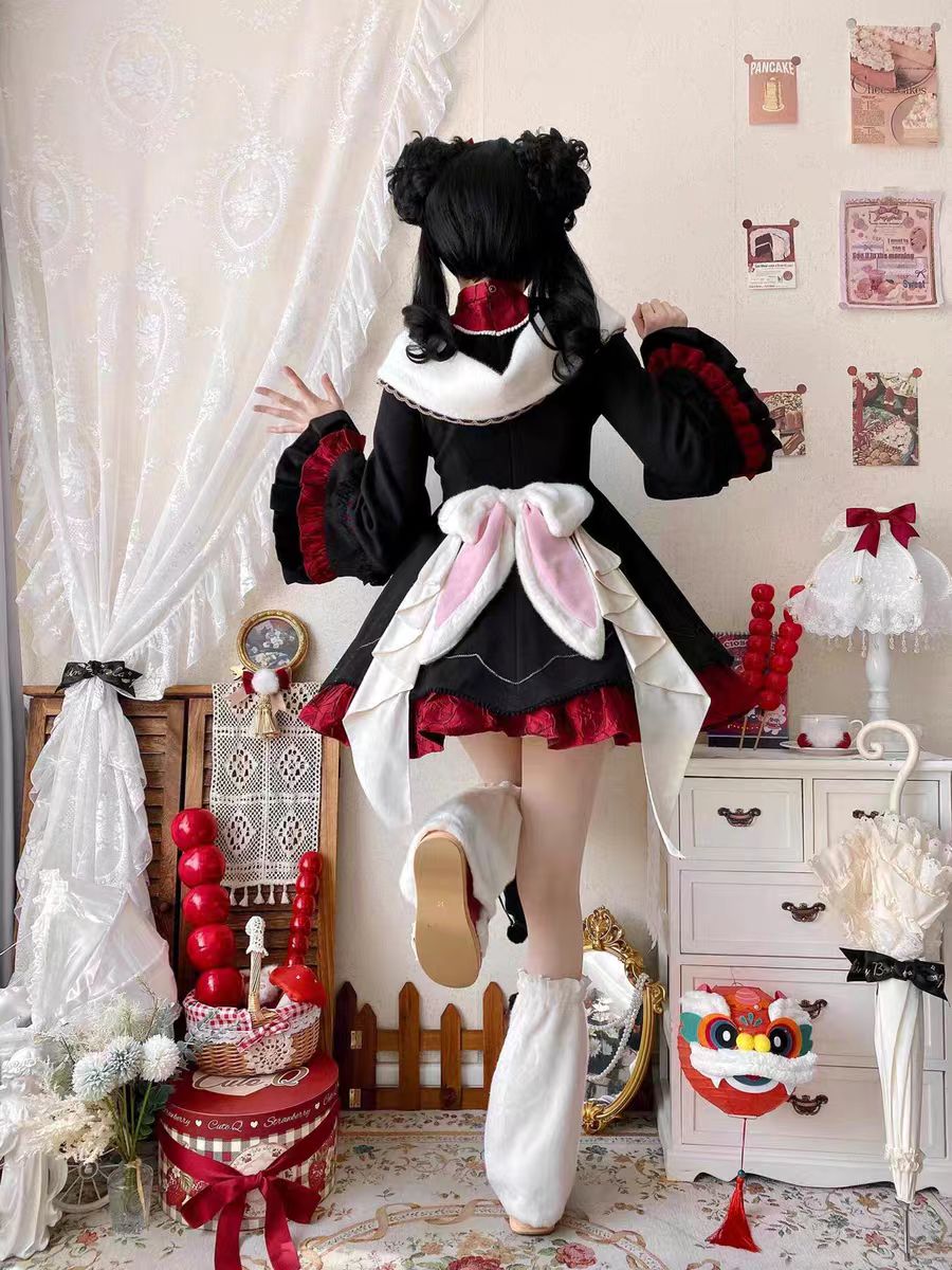 The Classic Black Red Lapel Collar Lolita Maid OP Dress captures a refined balance of elegance and playful sweetness. Its structured lapel collar, paired with charming bowknot details, highlights a delicate maid-inspired aesthetic. Long sleeves and layered ruffles enhance both comfort and volume, while the timeless black palette makes it versatile for multiple occasions. Perfect for tea parties, daily outings, or themed gatherings, this OP dress embodies classic Lolita grace with a touch of maid allure.