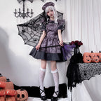 Unleash your inner darkness with this mesmerizing purple vampire maid dress. This gown masterfully blends Gothic Lolita elegance with haunting Halloween aesthetics, featuring a bewitching purple hue that embodies mystical allure. The design incorporates witch-inspired elements with doll-like details, creating a terrifyingly beautiful silhouette perfect for Halloween parties or cosplay events. Delicate lace accents and dramatic tailoring enhance the vampire maid fantasy, making you the center of attention at