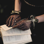 These gothic Lolita lace gloves are crafted with delicate sheer mesh and floral lace trim, blending elegance with sensual charm. The black design adds a mysterious gothic touch, while the thin fabric creates a graceful silhouette. Perfect for weddings, qipao styling, Halloween cosplay, or themed photo shoots, these gloves complete any Lolita or bridal-inspired outfit with timeless allure.