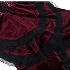 Embrace dark allure in this striking Gothic maid dress, where classic Lolita elegance meets daring contemporary style. The bold red and black color scheme creates a dramatic visual impact, accentuated by intricate lace detailing and a figure-flattering silhouette. This cheeky dress combines traditional maid aesthetics with provocative Lolita elements, perfect for cosplay events or making a bold fashion statement. The sensual cut and Gothic charm create an unforgettable look that balances innocence with unde