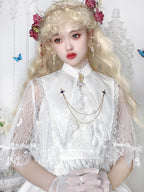 Design Concept:
This Gothic Lolita set in black and white features a pointed shell blouse with fake collar, brooch, and decorative chain, combining dark elegance with a refined subcultural aesthetic. Perfect for daily wear, tea parties, or themed gatherings, this set offers a polished Lolita look with intricate detailing.
