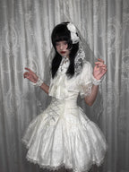 Design Concept:
This Gothic Lolita set in white combines elegance and subcultural charm. The outfit includes a shirt, bib, and short skirt, designed to accentuate the waist and create a slimming silhouette. Delicate detailing and a classic Lolita cut bring a refined yet playful aesthetic, making it perfect for daily wear or tea party occasions.&nbsp;