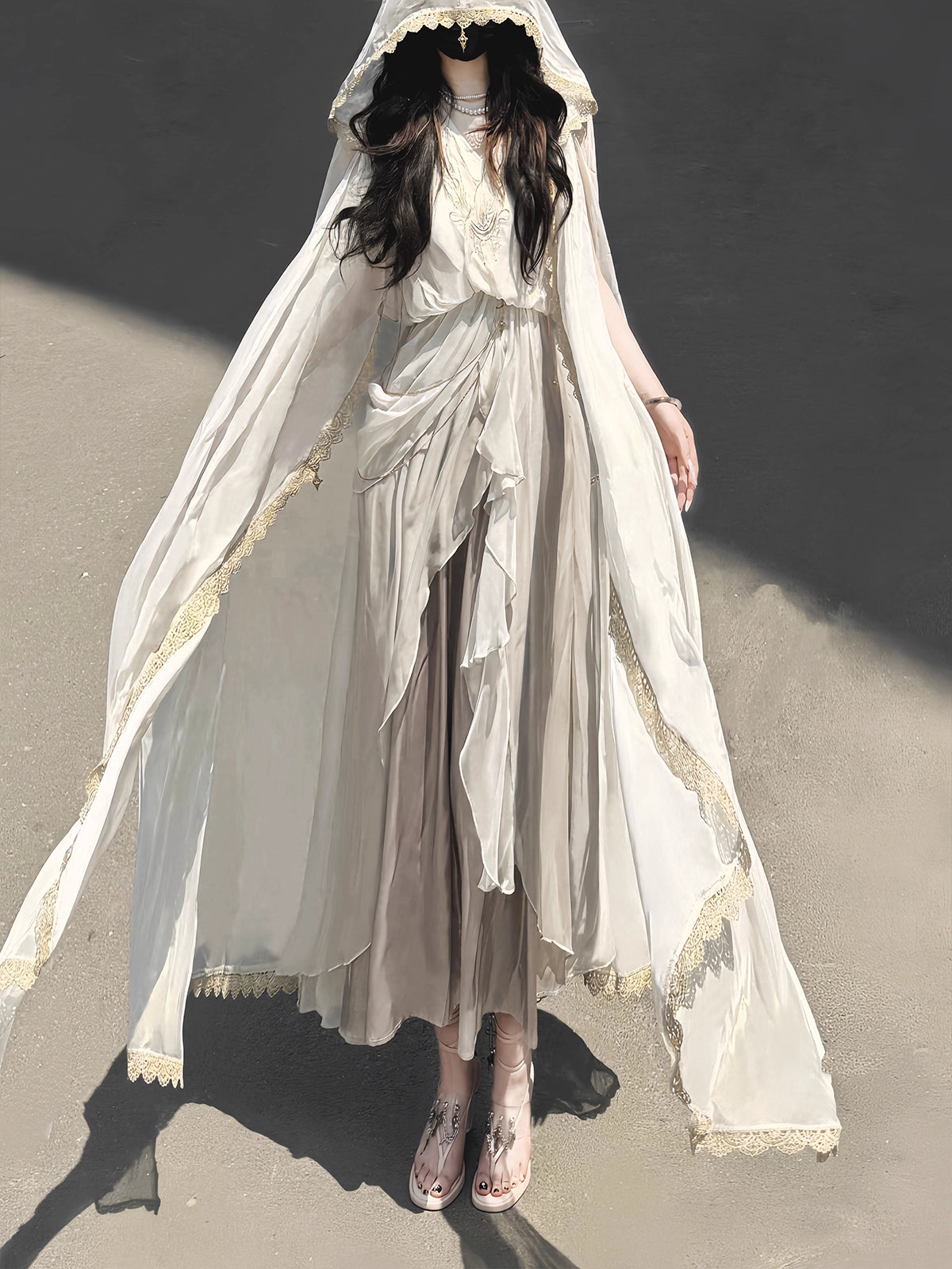 This White Angelic Greek Goddess Lolita Dress Set is designed to capture divine elegance and ethereal charm. The flowing cape adds a goddess-like aura, while the soft white palette enhances purity and grace. Inspired by Greek mythology and angelic beauty, the silhouette blends classic Lolita sweetness with majestic refinement. Perfect for special occasions, photoshoots, or themed gatherings, this set conveys a timeless elegance that feels both celestial and romantic.