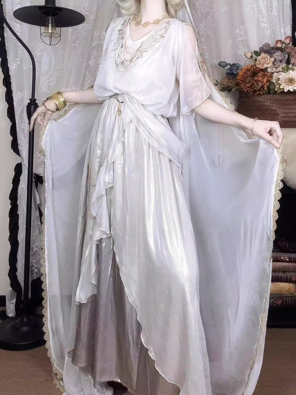 This White Angelic Greek Goddess Lolita Dress Set is designed to capture divine elegance and ethereal charm. The flowing cape adds a goddess-like aura, while the soft white palette enhances purity and grace. Inspired by Greek mythology and angelic beauty, the silhouette blends classic Lolita sweetness with majestic refinement. Perfect for special occasions, photoshoots, or themed gatherings, this set conveys a timeless elegance that feels both celestial and romantic.