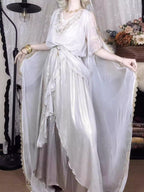 This White Angelic Greek Goddess Lolita Dress Set is designed to capture divine elegance and ethereal charm. The flowing cape adds a goddess-like aura, while the soft white palette enhances purity and grace. Inspired by Greek mythology and angelic beauty, the silhouette blends classic Lolita sweetness with majestic refinement. Perfect for special occasions, photoshoots, or themed gatherings, this set conveys a timeless elegance that feels both celestial and romantic.