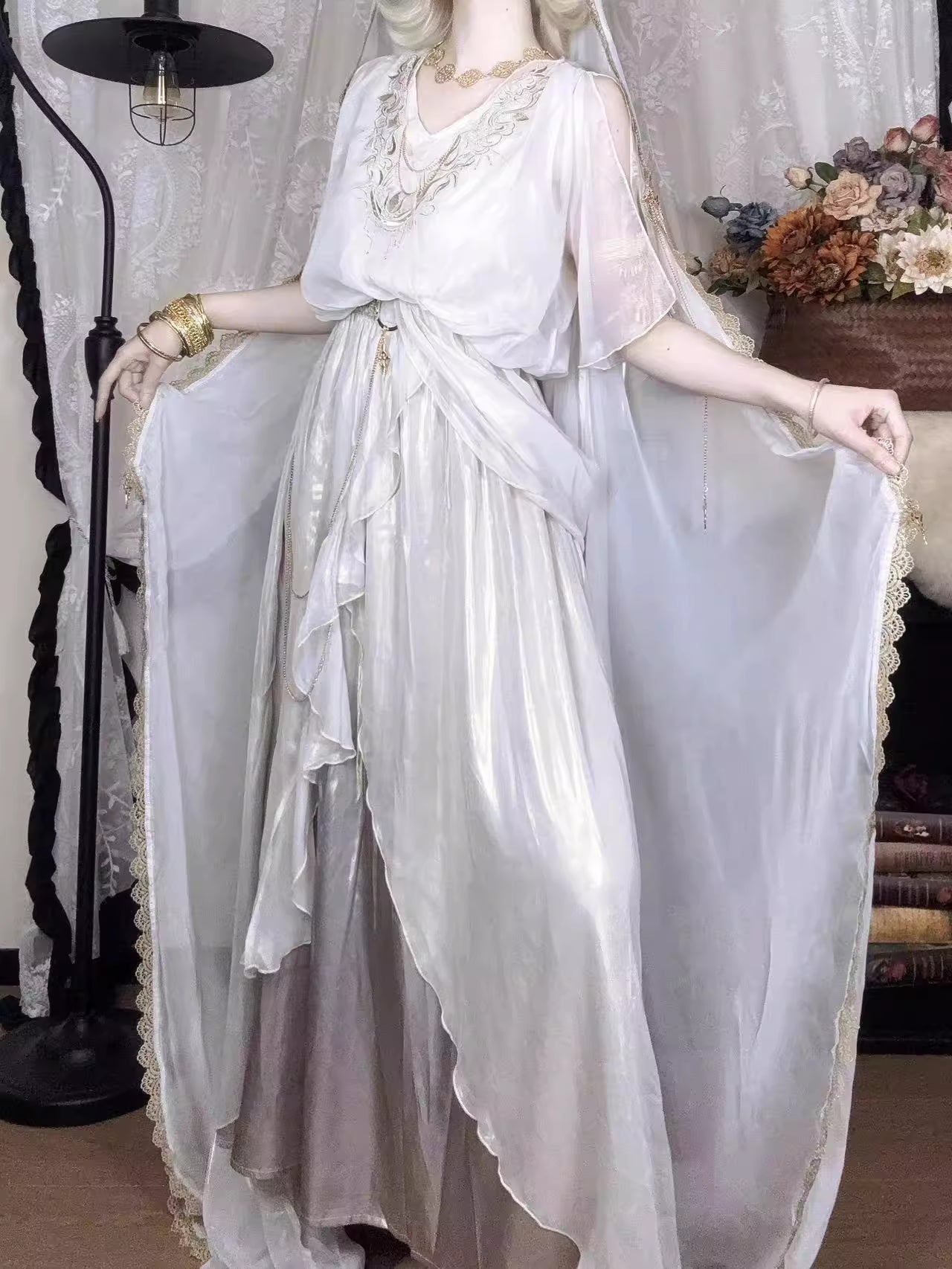 This White Angelic Greek Goddess Lolita Dress Set is designed to capture divine elegance and ethereal charm. The flowing cape adds a goddess-like aura, while the soft white palette enhances purity and grace. Inspired by Greek mythology and angelic beauty, the silhouette blends classic Lolita sweetness with majestic refinement. Perfect for special occasions, photoshoots, or themed gatherings, this set conveys a timeless elegance that feels both celestial and romantic.