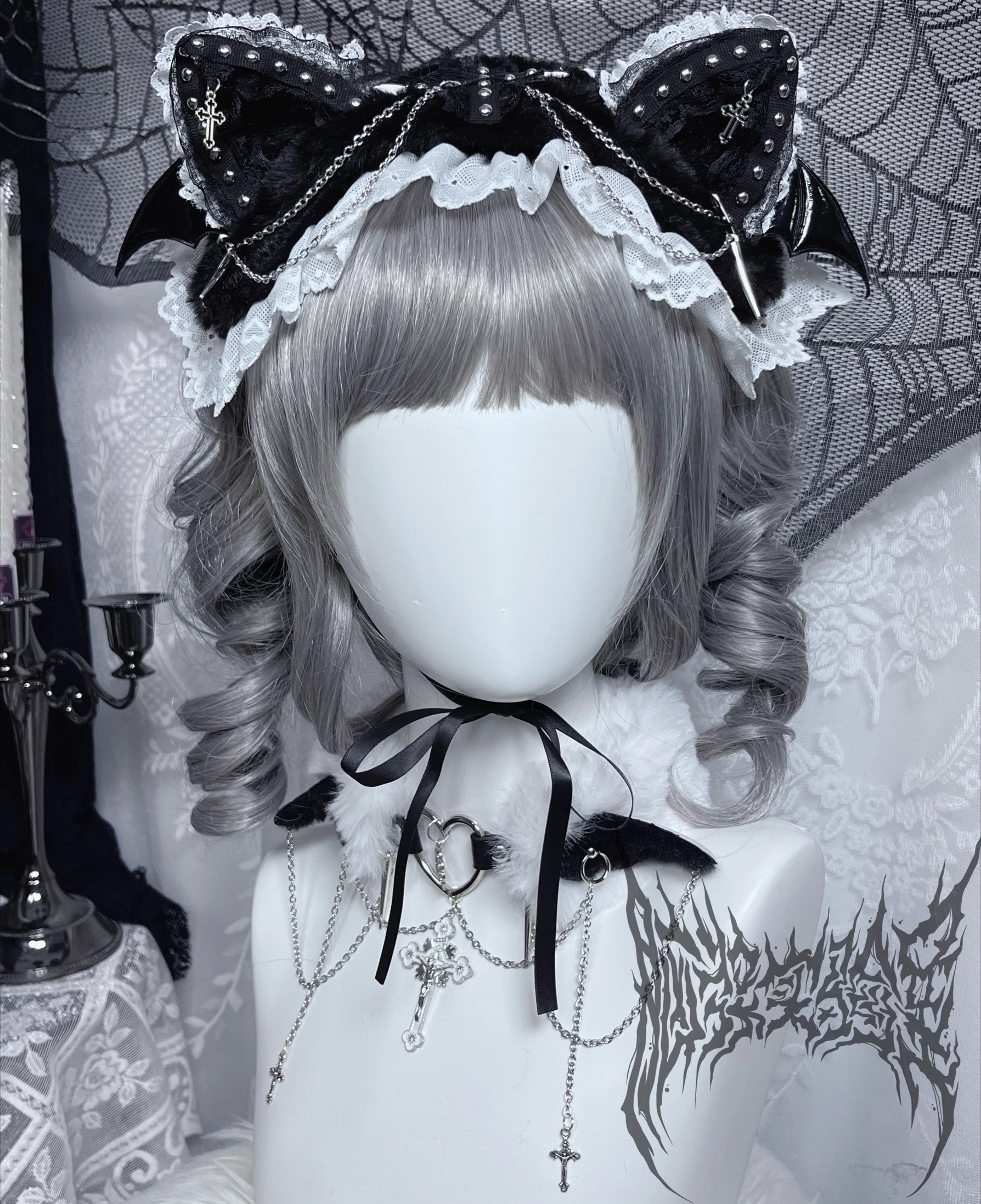 This original gothic Lolita hair clip is designed with devil cat ears and delicate lace, blending playful fantasy with dark elegance. Inspired by punk aesthetics, it combines rebellion with Lolita sweetness for a unique subculture look. Perfect for Halloween, cosplay, or alternative fashion styling, this accessory adds a bold statement to any gothic or Lolita outfit.