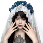 This veil is a masterpiece of subculture storytelling, blending macabre romance with industrial punk aesthetics. Intricate lace forms a decaying, beautiful base, while stark, industrial-style elements clash with soft, tattered edges. The centerpiece is a bold arrangement of black roses, symbolizing love in eternity. Designed for the fearless individual, it transcends convention for photoshoots, alternative weddings, and Halloween, embodying a beauty that is both dark and profoundly romantic.