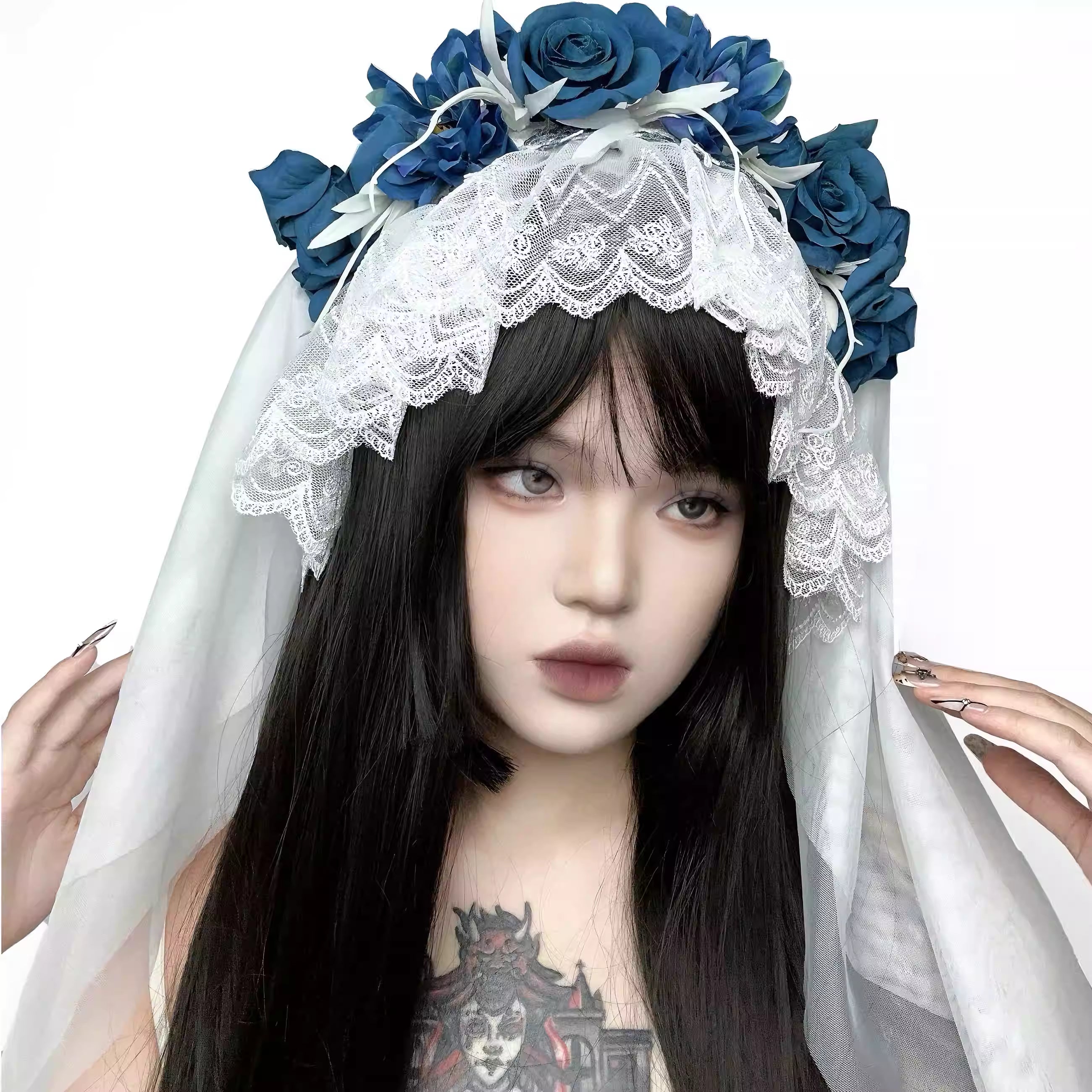 This veil is a masterpiece of subculture storytelling, blending macabre romance with industrial punk aesthetics. Intricate lace forms a decaying, beautiful base, while stark, industrial-style elements clash with soft, tattered edges. The centerpiece is a bold arrangement of black roses, symbolizing love in eternity. Designed for the fearless individual, it transcends convention for photoshoots, alternative weddings, and Halloween, embodying a beauty that is both dark and profoundly romantic.