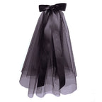 This short gothic bride veil is designed for a mysterious and dramatic Halloween style. Featuring a large bow with flowing ribbons, it blends vintage elegance with dark fantasy. The veil creates a ghostly yet stylish look, perfect for cosplay, themed parties, or photo shoots. A striking accessory that transforms any outfit into a hauntingly beautiful statement.
