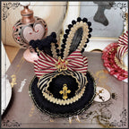The Eternal Rose handmade accessory set combines playful bunny ears with a charming mini top hat hair clip, crafted for a whimsical Lolita look. Designed with gothic elegance and festive Halloween flair, it balances sweetness with dramatic fantasy. Perfect for cosplay, themed parties, or photo shoots, this set offers versatile styling that enhances Lolita fashion with originality and charm.