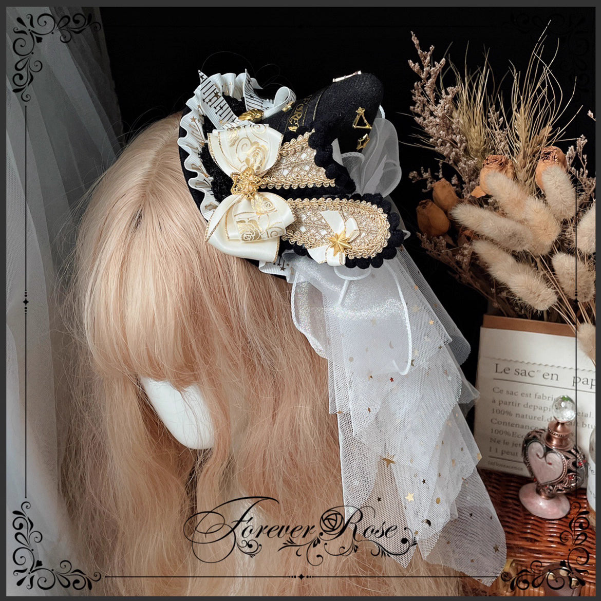 The Eternal Rose handmade accessory set combines playful bunny ears with a charming mini top hat hair clip, crafted for a whimsical Lolita look. Designed with gothic elegance and festive Halloween flair, it balances sweetness with dramatic fantasy. Perfect for cosplay, themed parties, or photo shoots, this set offers versatile styling that enhances Lolita fashion with originality and charm.