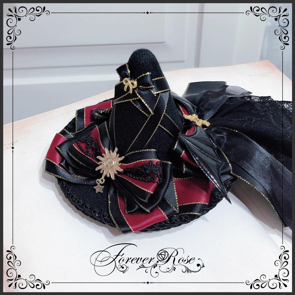 The Eternal Rose handmade accessory set combines playful bunny ears with a charming mini top hat hair clip, crafted for a whimsical Lolita look. Designed with gothic elegance and festive Halloween flair, it balances sweetness with dramatic fantasy. Perfect for cosplay, themed parties, or photo shoots, this set offers versatile styling that enhances Lolita fashion with originality and charm.