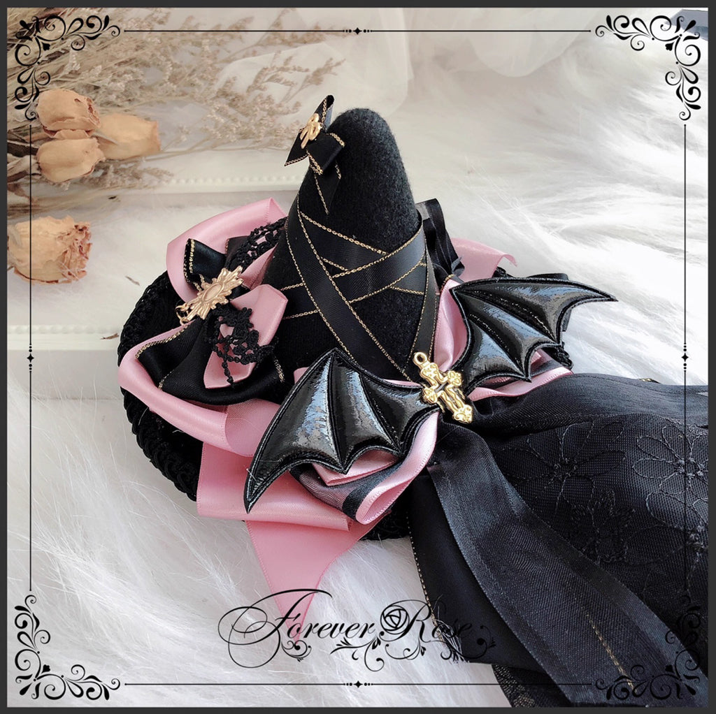 The Eternal Rose handmade accessory set combines playful bunny ears with a charming mini top hat hair clip, crafted for a whimsical Lolita look. Designed with gothic elegance and festive Halloween flair, it balances sweetness with dramatic fantasy. Perfect for cosplay, themed parties, or photo shoots, this set offers versatile styling that enhances Lolita fashion with originality and charm.